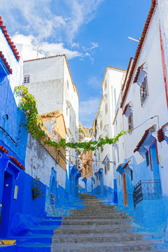 Empty narrow street in medina of Chefchaouen, Morocco. Blue pearl in the mountains of North Africa