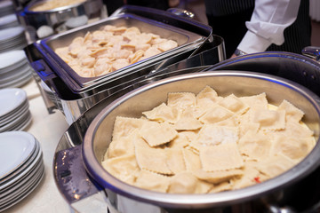 
fresh pasta displayed on stainless steel fountains at event