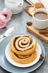 Obraz na płótnie Canvas Cinnamon rolls bun, danish pastry with coffee cup for breakfast.