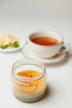 Chia Pudding With Orange And Lemon Tea On A White Background