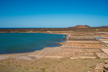 Aerial view on the salt production fields on Lanzarote island  on a sunny day 