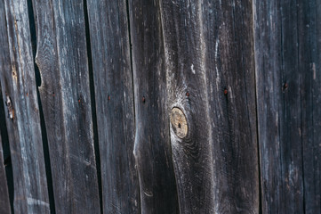 vertical wooden old plank fence 