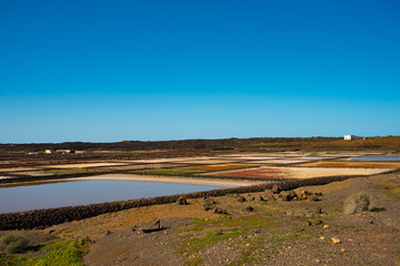 Aerial view on the salt production fields on Lanzarote island  on a sunny day 