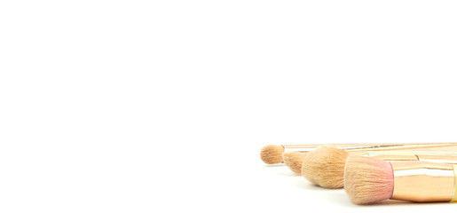 Isolated of woman cosmetic brushes.