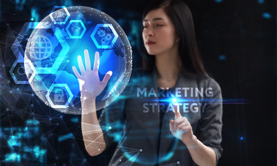 Business, Technology, Internet and network concept. Young businessman working on a virtual screen of the future and sees the inscription: Marketing strategy