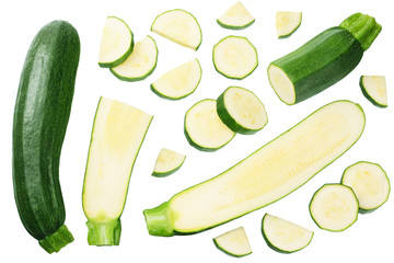 fresh green zucchini with slices isolated on white background. top view