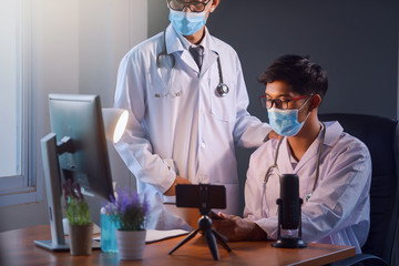 Medical online concept. Doctor working with video call and stethoscope in modern office.octor video...