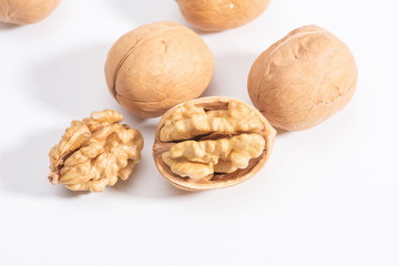 A pile of walnuts isolated in a white background.