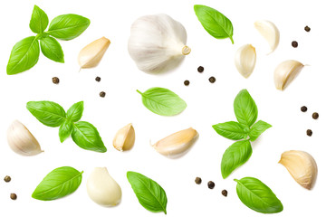 garlic with basil isolated on white background, top view