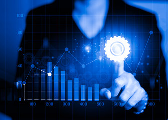 Analyzing business industry with financial data graph. Analysis of industry numerical data and stock market communication with businesses worldwide.