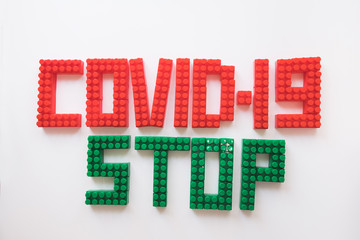 description covid-19 of the constructor blocks on the white background