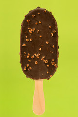 Ice cream popsicle covered with chocolate