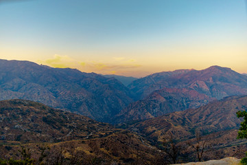 fire at sunset in the mountains