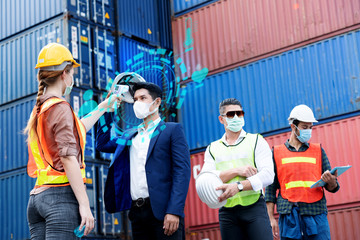 Safety of engineer team or foreman Have a helmet, Body temperature monitor to healthy while working and mask in factory or container. Prevent accident work or dust and Coronavirus. Concept New Normal