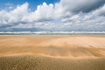 Fototapeta na wymiar sand beach and sea during a windy day in Ostend