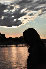 Fototapeta premium sunset silhouette of a woman