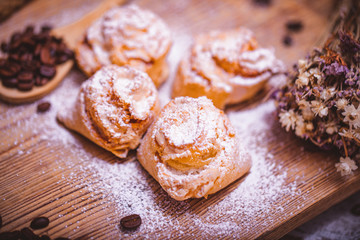 homemade backed cookies with coffee beans on a wooden desk with blure background. Soft focus photo.