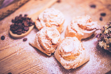 homemade backed cookies with coffee beans on a wooden desk with blure background. Soft focus photo.