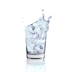 Water splashing from glass isolated on white background.