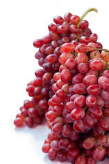 Bunch red grape on white background.