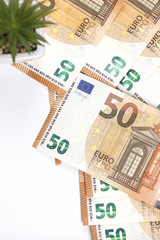 Stack of 50 euro banknotes isolated on a white background. Financial crisis. Purchasing power of money