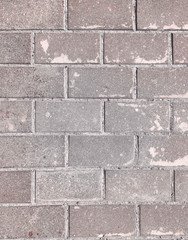 Rectangular stone tile located on the ground