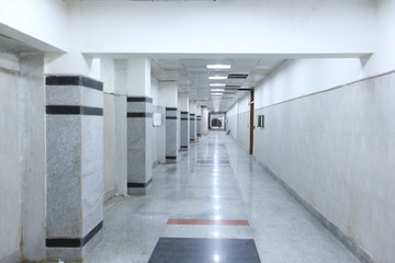 New Delhi, Delhi/India- May 20 2020: Modern corridor of a newly constructed hospital building with grey tiles and marbles.