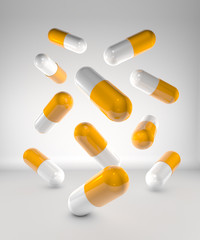 Medicine capsules on white background