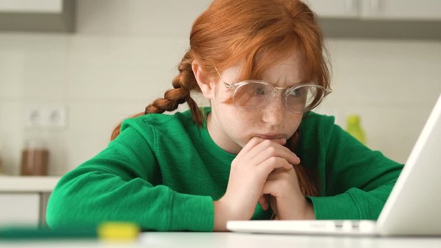 Difficulties of homeschooling. Child tired of hard task, feel bad look at screen
