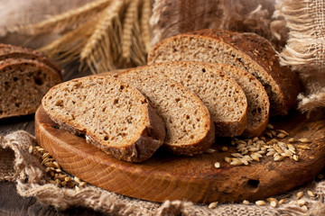 Freshly baked sourdough bread on wooden cutting board
