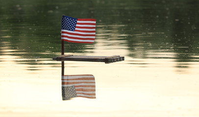 4th of July, US Independence Day, USA flag, wooden raft on the water
