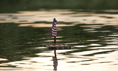 4th of July, US Independence Day, USA flag, wooden raft on the water