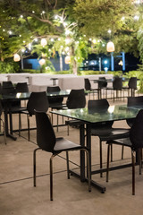 Seating of the outdoor restaurant at night