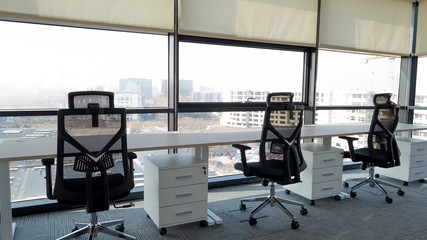 View of empty office with two chairs