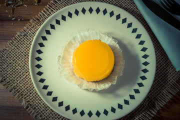 A brazilian dessert made with eggs and coconut. Quindim