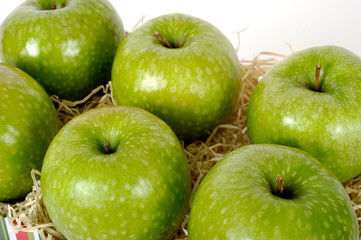green apples in gift box. White background. close view. top view. isolated

