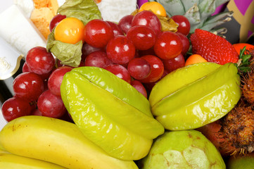 variety of fresh tropical fruits. White background. close view. top view. isolated

