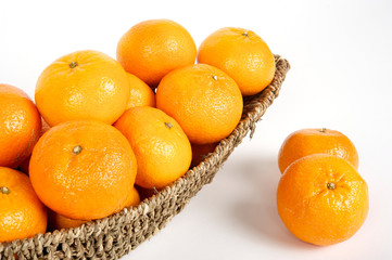 oranges in basket. White background. isolated