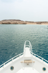 Fototapeta premium Rest on the white yacht (ship) in the Bay of Sharm El Sheikh. Photo on a sunny day..Holidays in 2018.