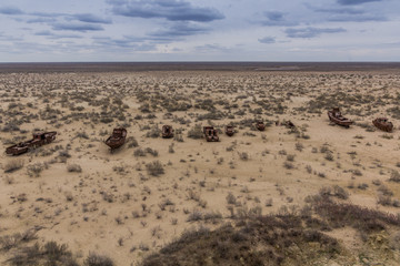 Rusting ships at the Ship Cemetery near Moynaq village at the former coast of Aral Sea, Uzbekistan