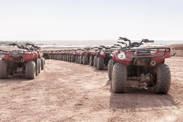 Riding a quad bike in the desert near the Sinai Mountains. Sharm El Sheikh. Photo on a sunny day..Holidays in 2018.