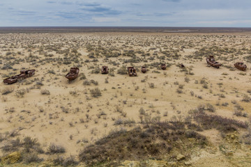 Rusting ships at the Ship Cemetery near Moynaq village at the former coast of Aral Sea, Uzbekistan