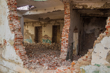 Ruins of abandoned fish canning factory in former Aral Sea port town Moynaq (Mo‘ynoq or Muynak), Uzbekistan