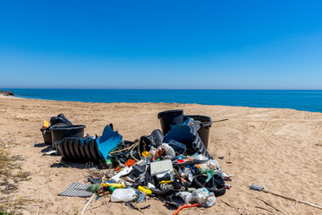 Messy garbage beach Barcelona Spain