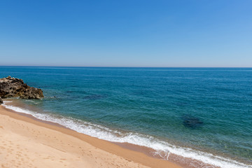 Fototapeta na wymiar Sant Pol de Mar empty beach Spain