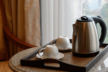 Kettle and tea cup in the living room
