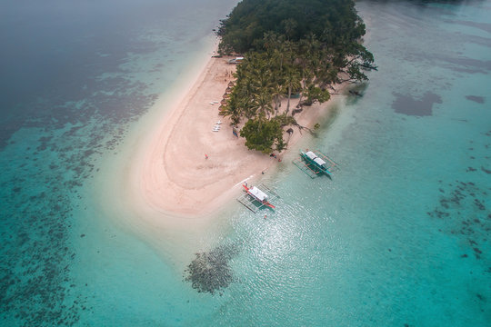 Aerial view of one of the famous tourist spots in the town of Port Barton is the Inaladelan Island resort. An island part of Port Barton in the municipality of San Vicente, Palawan, Philippines.