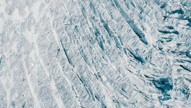 Aerial view of a glacier textures and crevasses, Chiesa in Valmalenco, Lombardy, Italy.