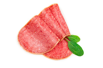 Salami slices isolated on white background.