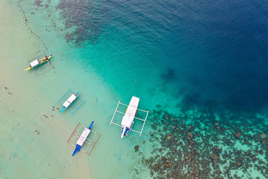 Aerial view of Bangka Boats, Albaguen Island,Port Barton, , Palawan, Philippines